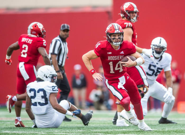 Indiana's Jack Tuttle (14) runs during the first half of the Indiana versus Penn State football game at Memorial Stadium on Satruday, Nov. 5, 2022.